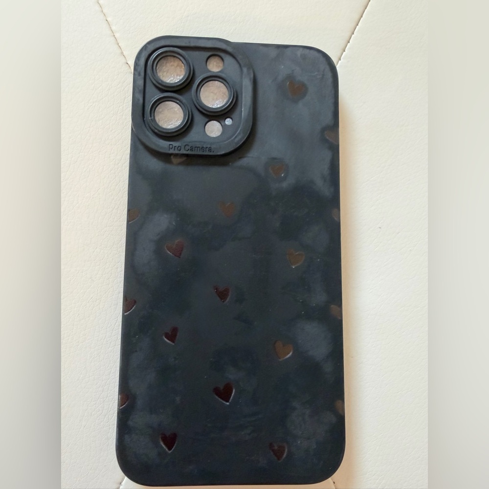 Source Unknown Black Phone Case with Subtle Heart Cutouts